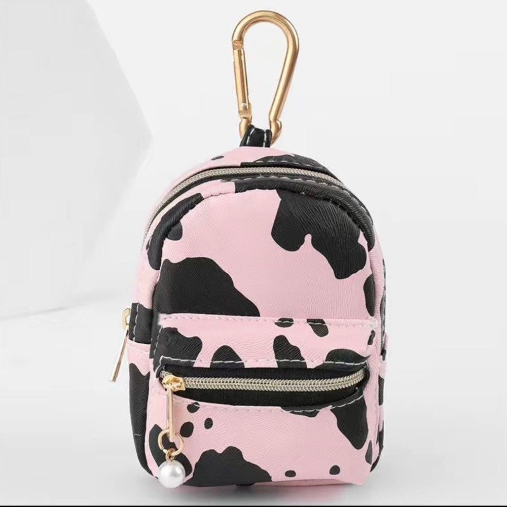 Pink cow print change purse